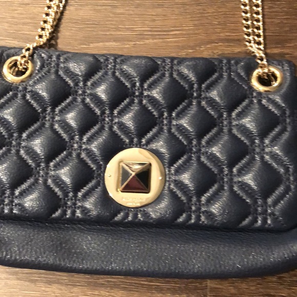 Kate Spade navy blue purse with gold detailing. - Picture 3 of 5